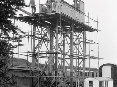 23rd July 1985.The end of an era - the old water tank that served the railway since 1973 is being dismantled and replaced by one of fully welded construction. A number of the old panels were later reused for another water tank.